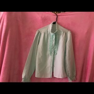 Beautiful green blouse w/ruffles.